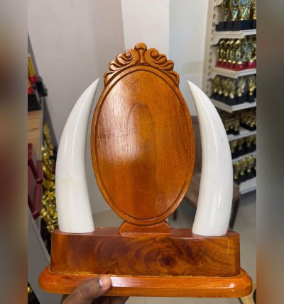 Premium Mahogany Wood Tusk Oval Memento – 39 cm Handcrafted Wooden Trophy with Elephant Tusk Design | Cultural Gift & Wildlife Decor by Mannar Craft